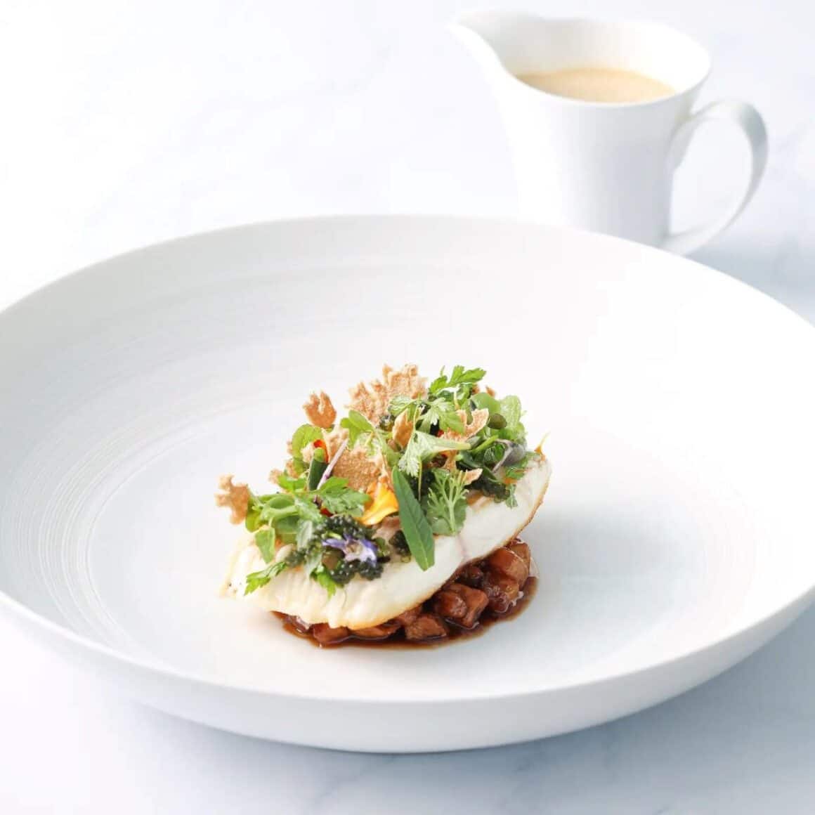 o portie de mancare fine dining din restaurantul 11 woodfire din dubai