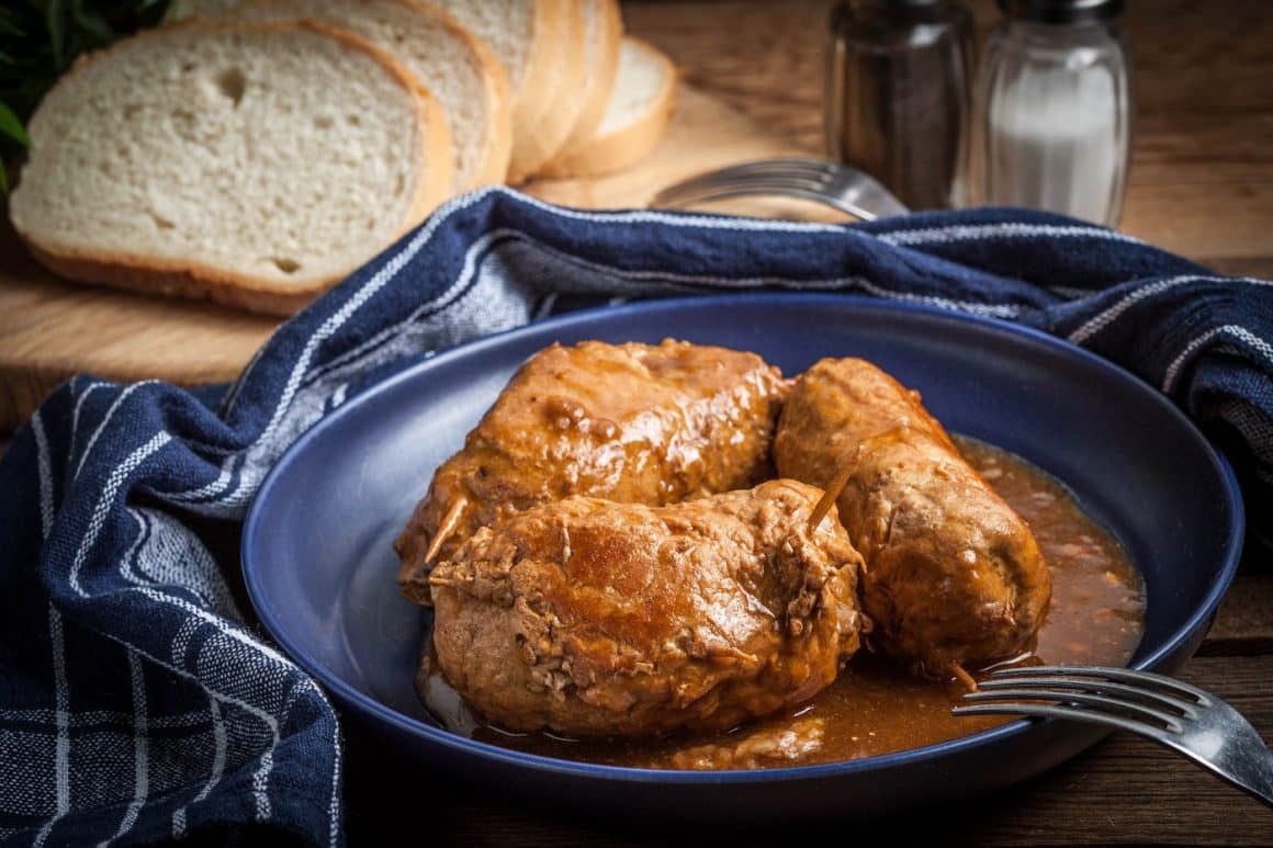 Tasty roulades beef on plate with sauce, close up. Mâncare din Malta, mâncare malteză